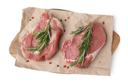 Fresh raw meat with rosemary and spices isolated on white, top view