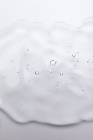 Sample of cosmetic oil on white background, top viewの写真素材