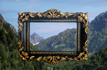 Vintage frame and beautiful mountains under blue skyの写真素材