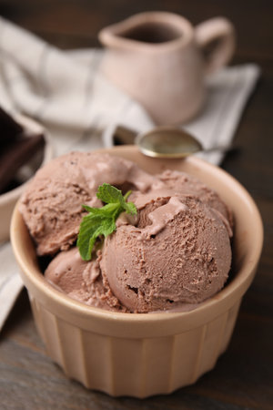 Bowl of tasty chocolate ice cream on table, closeupの写真素材