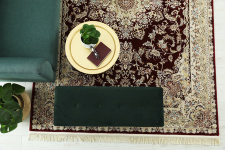 Stylish living room with beautiful carpet and furniture, top view. Interior design