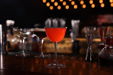 Glass of fresh Martini cocktail on bar counter