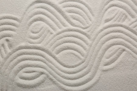 White sand with pattern as background, top view. Zen conceptの写真素材