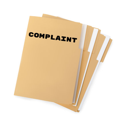 File folder with word Complaint on white background, top viewの写真素材