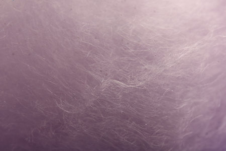 Purple cotton candy as background, closeup viewの写真素材