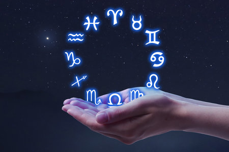 Astrology. Woman with zodiac wheel against starry night sky, closeupの写真素材