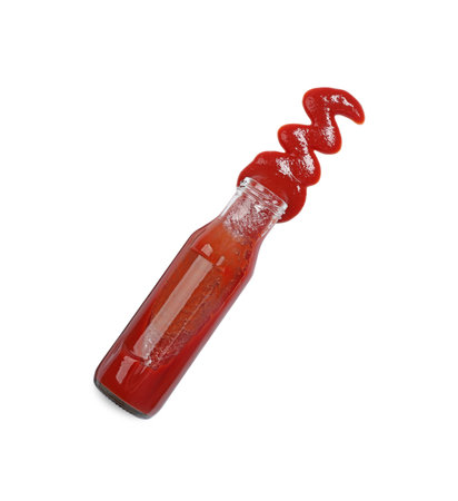Ketchup and glass bottle isolated on white, top viewの写真素材
