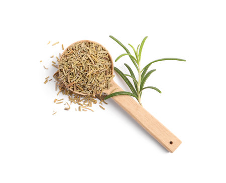 Wooden spoon with fresh and dry rosemary isolated on white, top viewの写真素材