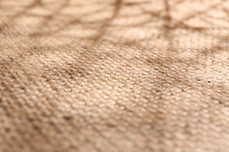 Texture of beige burlap fabric, closeup viewの写真素材