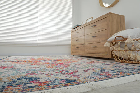 Stylish living room with beautiful carpet and furniture, low angle view. Interior designの写真素材