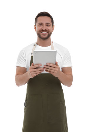 Smiling man with tablet on white backgroundの写真素材