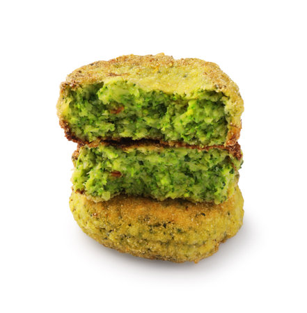 Tasty whole and cut vegan cutlets isolated on whiteの写真素材