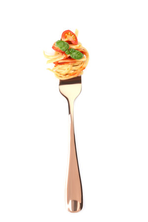 Fork with tasty pasta, tomato sauce and basil isolated on white, top viewの写真素材