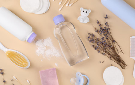 Flat lay composition with baby care products and accessories on beige backgroundの写真素材