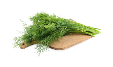 Wooden board with fresh dill isolated on whiteの写真素材