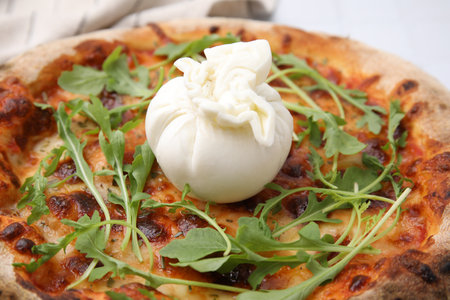 Delicious pizza with burrata cheese and arugula, closeupの写真素材