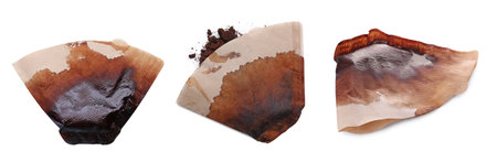 Set with used coffee filters isolated on whiteの写真素材