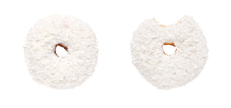 Whole and bitten tasty donuts with sprinkles isolated on whiteの写真素材