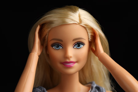 Mykolaiv, Ukraine - September 1, 2023: Beautiful Barbie doll on black backgroundの写真素材