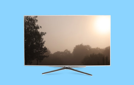 TV screen with movie frame on light blue background