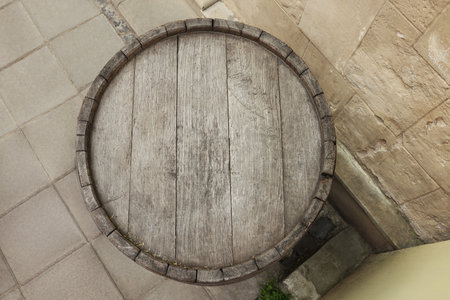 Traditional wooden barrel outdoors, top view. Wine makingの写真素材
