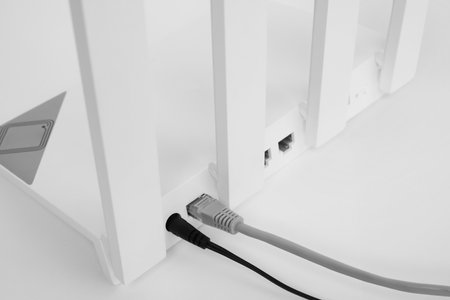 One modern Wi-Fi router on white background, closeupの写真素材