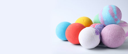 Many different bath bombs on white background. Space for textの写真素材