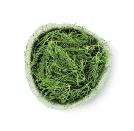 Bowl of fresh dill isolated on white, top viewの写真素材