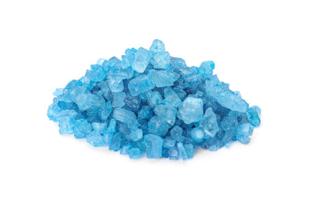 Heap of light blue sea salt isolated on white