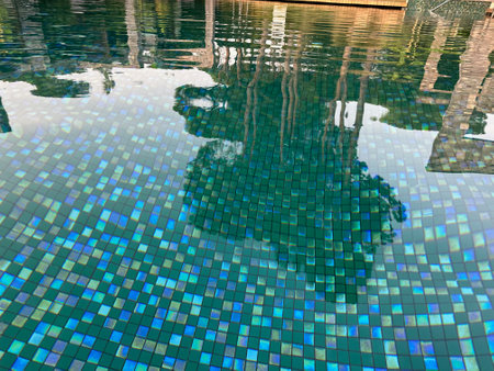 Clear rippled water in outdoor swimming pool