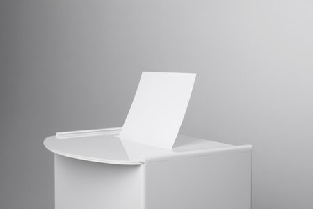 Ballot box with vote on light gray background, closeup. Election timeの写真素材