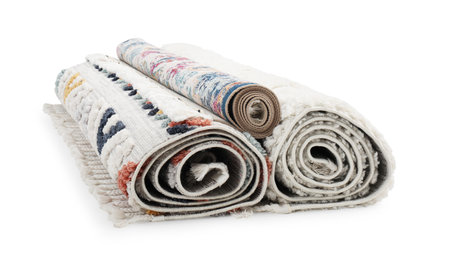 Rolled carpets on white background. Interior elementの写真素材
