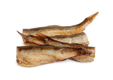 Many tasty canned sprats isolated on whiteの写真素材