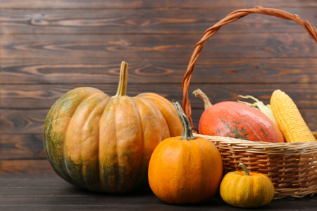 Happy Thanksgiving day. Beautiful composition with pumpkins on wooden tableの写真素材