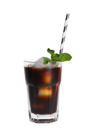 Refreshing iced coffee in glass with straw and mint leaves isolated on white