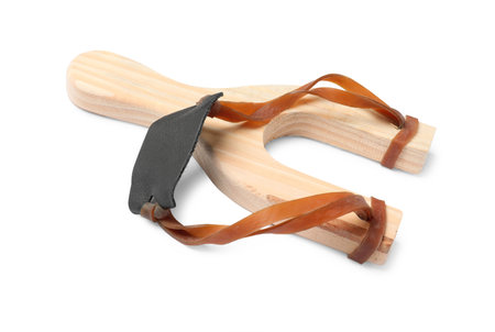 One wooden slingshot with leather pouch isolated on whiteの写真素材