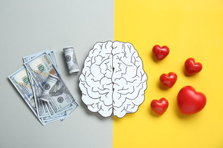 Emotional and rational. Paper human brain, dollar banknotes and red hearts on color background, flat...
