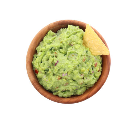 Bowl of delicious guacamole with nachos chips isolated on white, top viewの写真素材