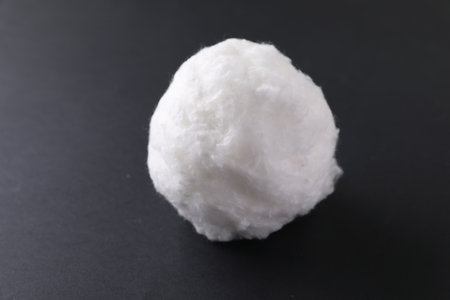 Ball of clean cotton wool on gray background, closeupの写真素材