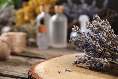 Closeup view of dry lavender flowers on wooden table, space for text. Medicinal herbsの写真素材