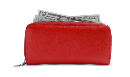 Stylish red leather purse with dollar banknotes on white background