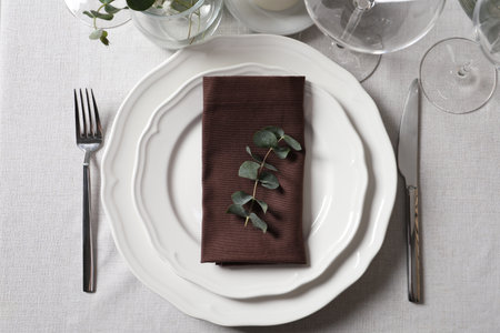 Beautiful table setting with floral decor, flat lay