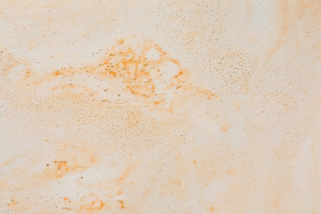 Foam after dissolving bath bomb in water, closeup