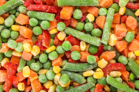 Mix of different frozen vegetables as background, top viewの写真素材