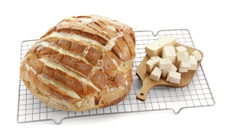 Freshly baked bread with tofu cheese isolated on white