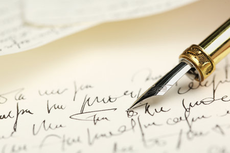 One fountain pen on handwritten letter, closeup