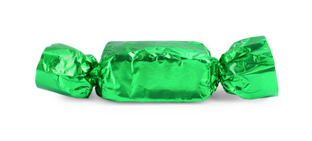 Tasty candy in green wrapper isolated on whiteの写真素材
