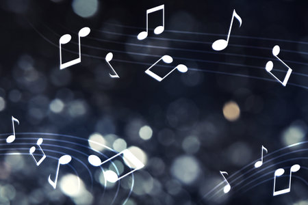 Music notes on dark background, bokeh effectの写真素材