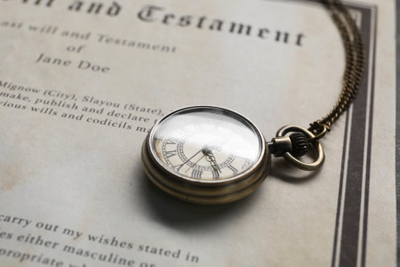 Last Will and Testament with pocket watch, closeup