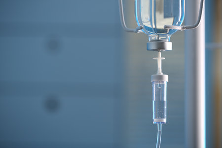 IV drip against blurred background, space for textの写真素材